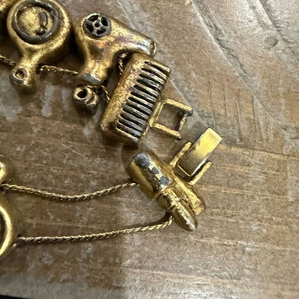 Vintage Hair and Makeup Gold Tone Charm Bracelet